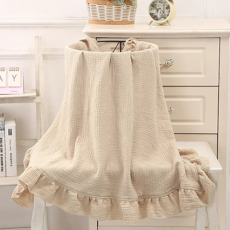 Organic cotton ruffle muslin swaddle